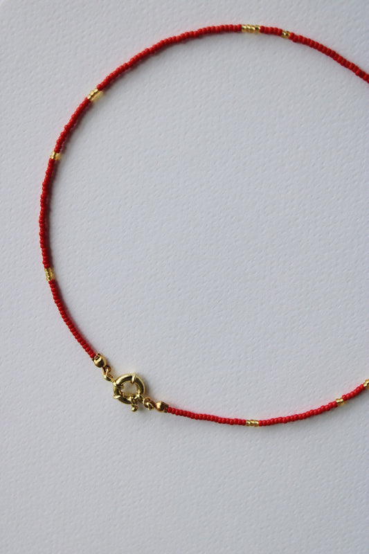 Collar mostacillas rojo timón